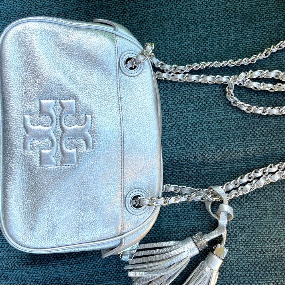 Tory Burch silver purse with tassels and double strap!
